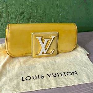 Louis Vuitton SOBE clutch